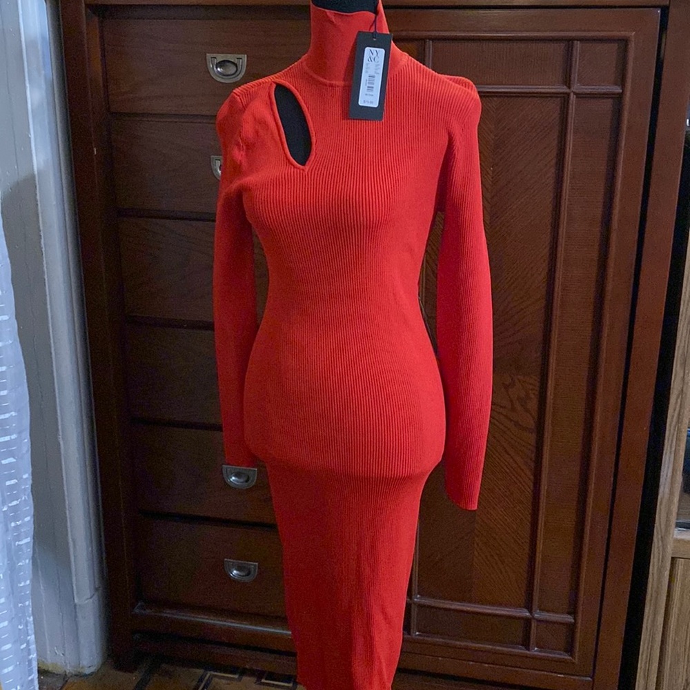 Red sweater dress. Size medium. New with tags .